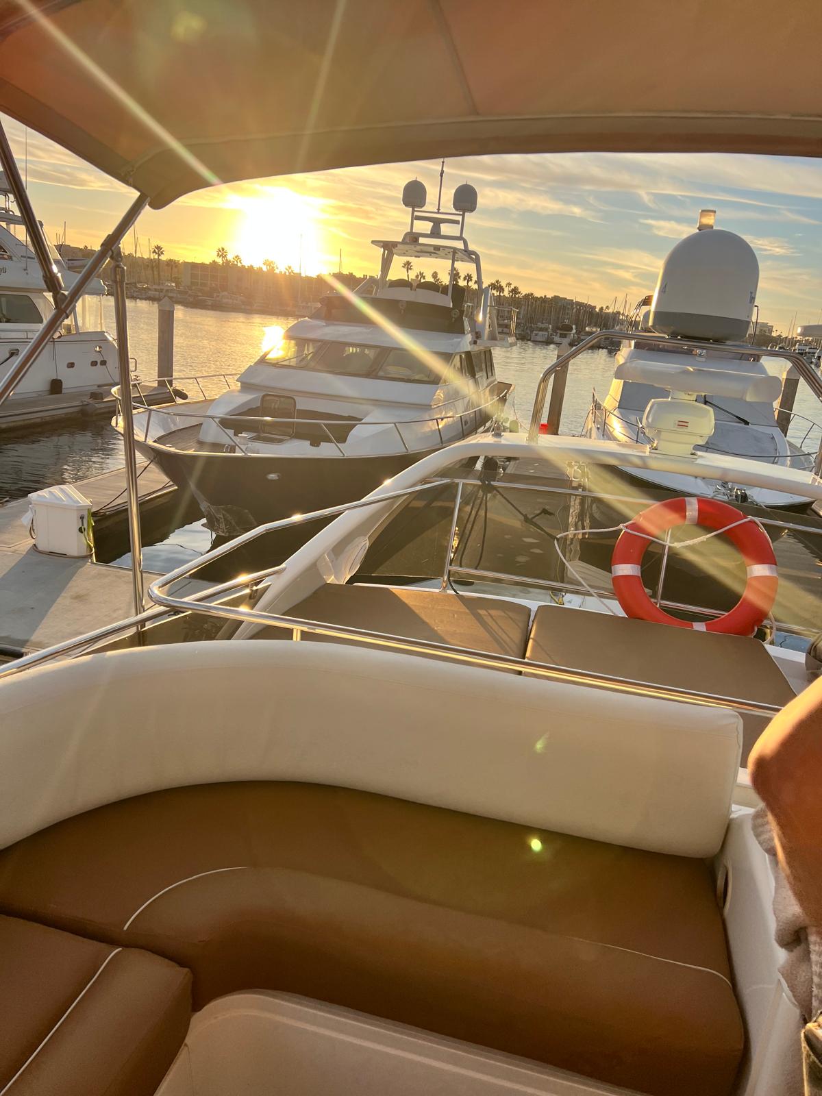 Boat seating with marina sunset view