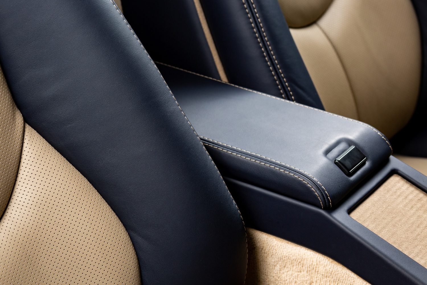 Navy and tan perforated leather seat